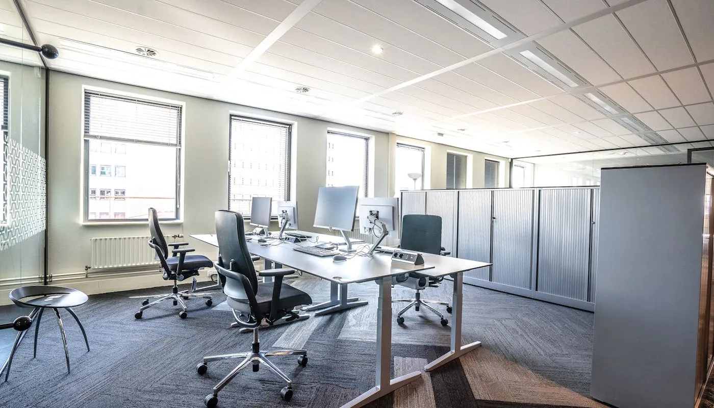 Modern open-plan office with ergonomic workstations